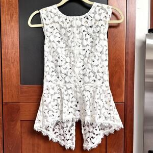 BCBGMAXAZRIA Evia Off-White Lace Peplum Top XS Fringe Hem High-Low